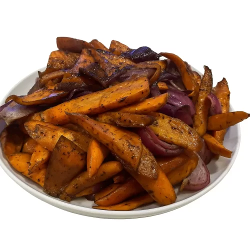 honey sumac carrots in a white bowl